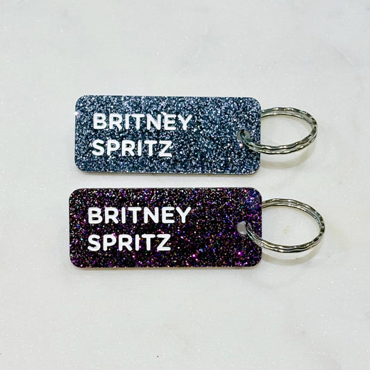 BRITNEY SPRITZ Porte-clés à paillettes Or