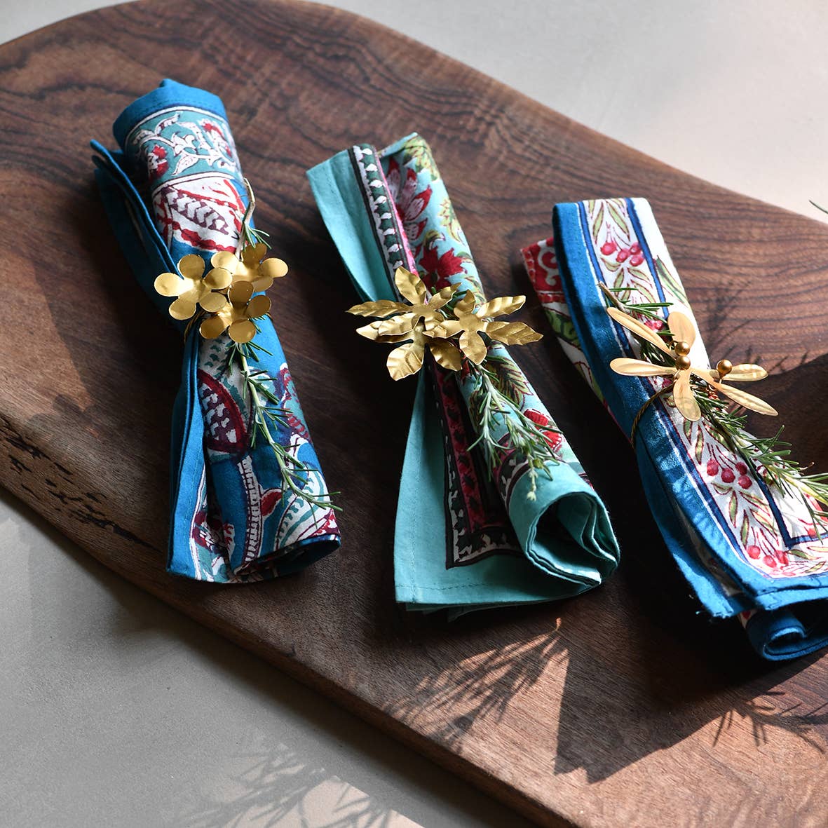 Ronds de serviette laiton assortis