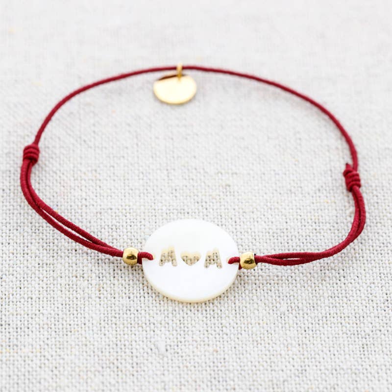 Bracelet élastique en acier avec nacre: Moutarde