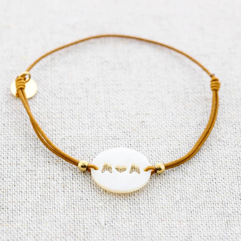 Bracelet élastique en acier avec nacre: Moutarde